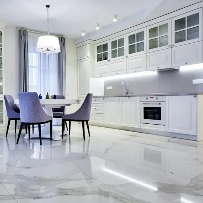 Polished marble-effect kitchen floor cleaned by Cornwall Floorcare