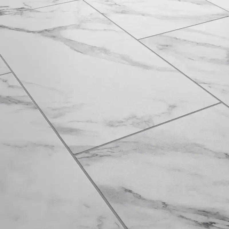 Close-up of polished marble-effect stone tiles cleaned by Cornwall Floorcare