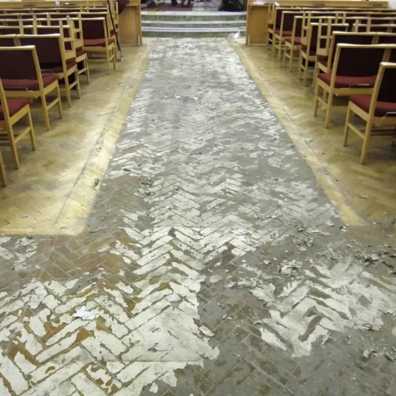 Parquet wood floor during restoration process by Cornwall Floorcare