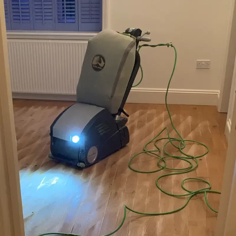 Professional wood floor sanding machine in use by Cornwall Floorcare