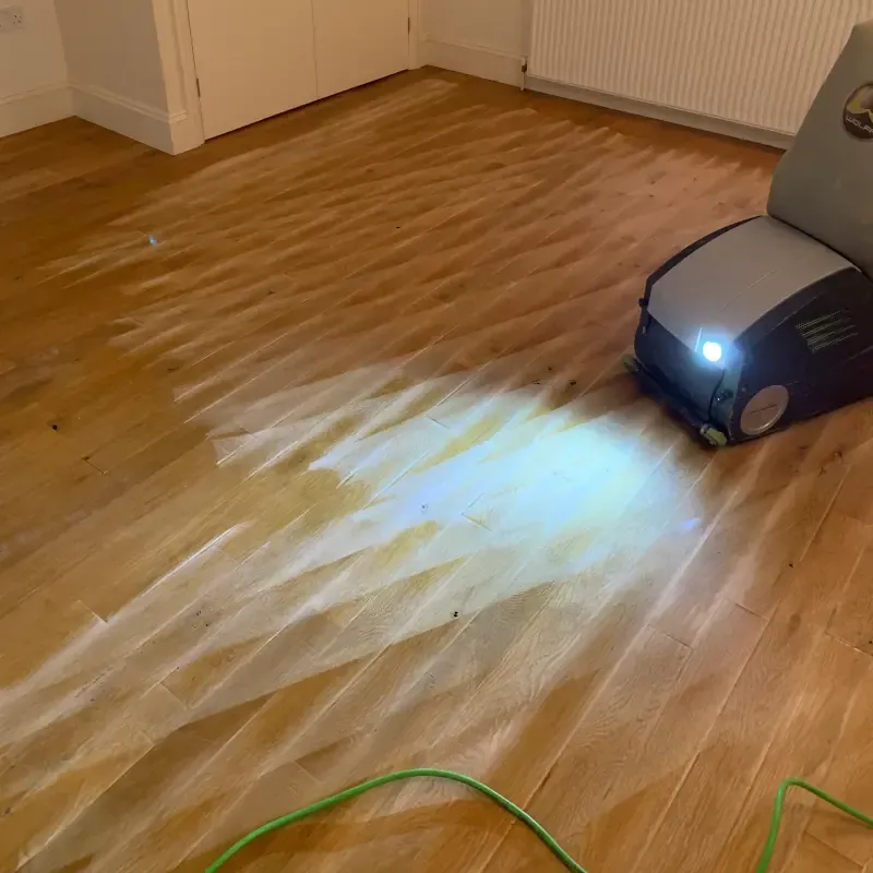 Wood floor sanding in progress during restoration by Cornwall Floorcare