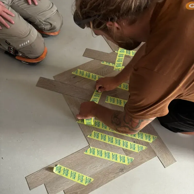 Herringbone LVT layout planning and dry fitting by Cornwall Floorcare