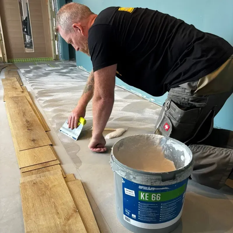 Floor preparation and adhesive application by Cornwall Floorcare