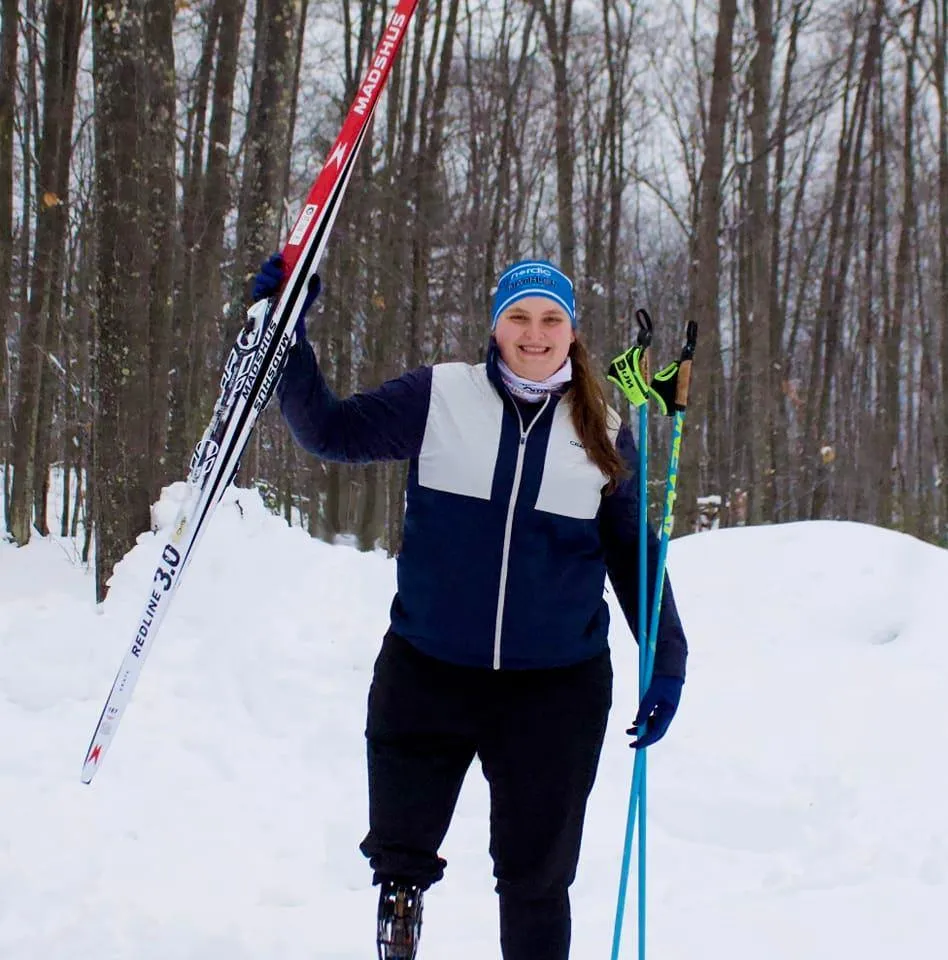 Image of Casey with skis