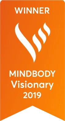 Mindbody Visionary 2019 award ribbon for Peak Zone Fitness, emphasizing fitness coaching and personal training excellence.