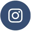 Instagram logo featuring a white camera icon within a circular dark blue background.