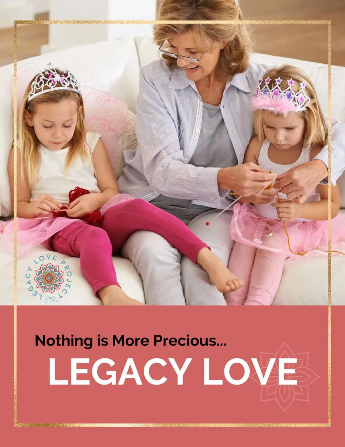 A grandmother and two young girls sit on a sofa, enjoying a creative activity together