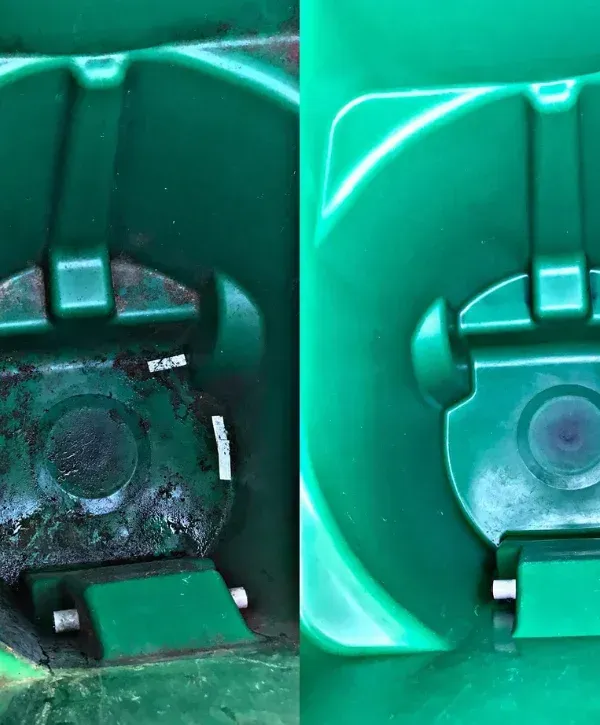 A split image showing the inside of a dirty green bin on the left and a clean green bin on the right.