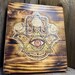 Custom wooden wall hanging with detailed geometric patterns
