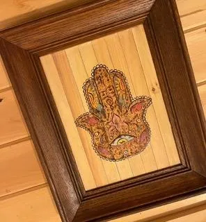 Norse-inspired wood carving featuring runes and knotwork