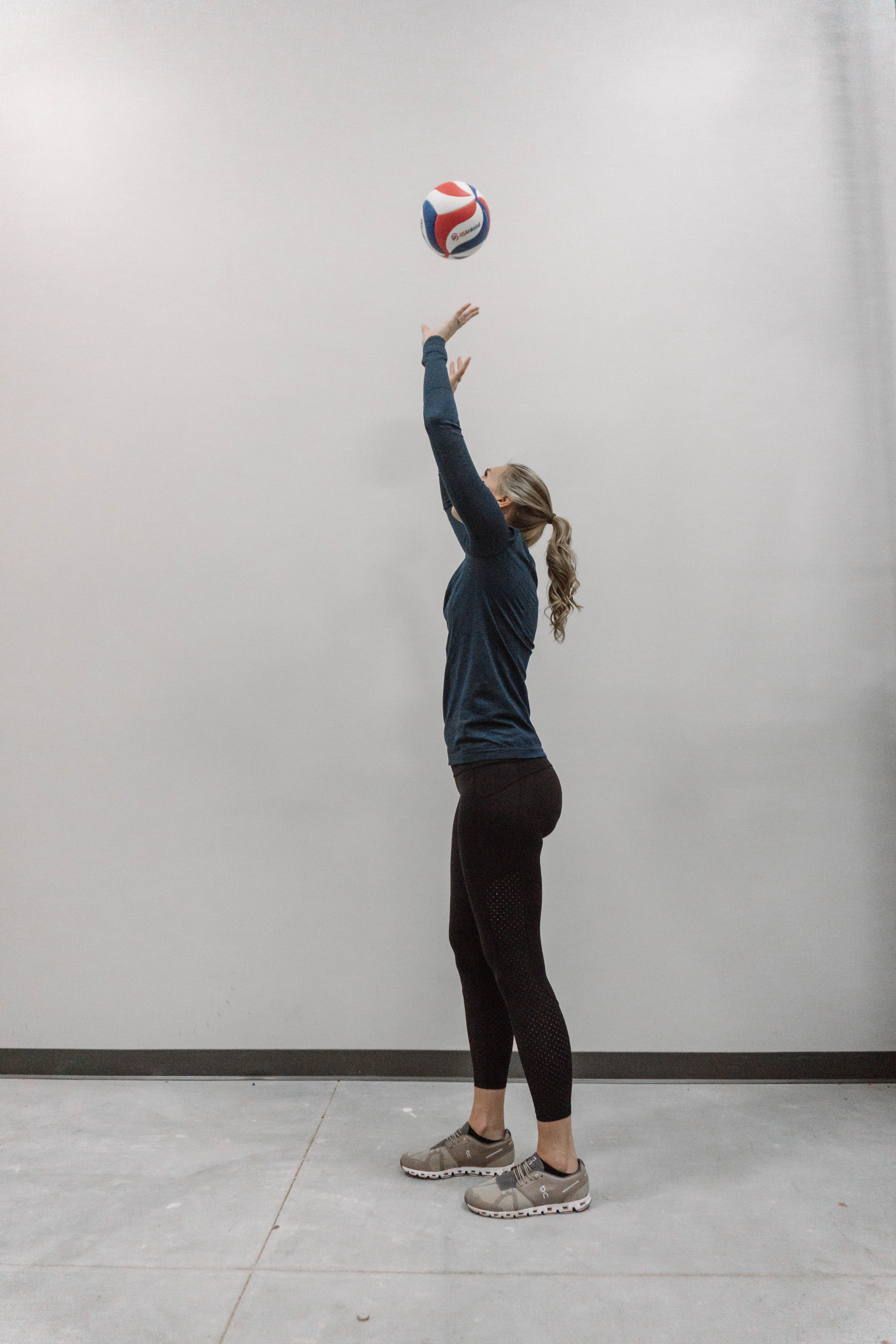 Kristin Bignell, Registered Physical Therapist volleying a volleyball