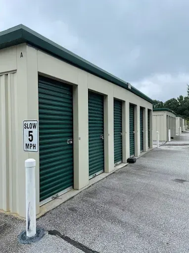 a row of metal lockers with numbers on them