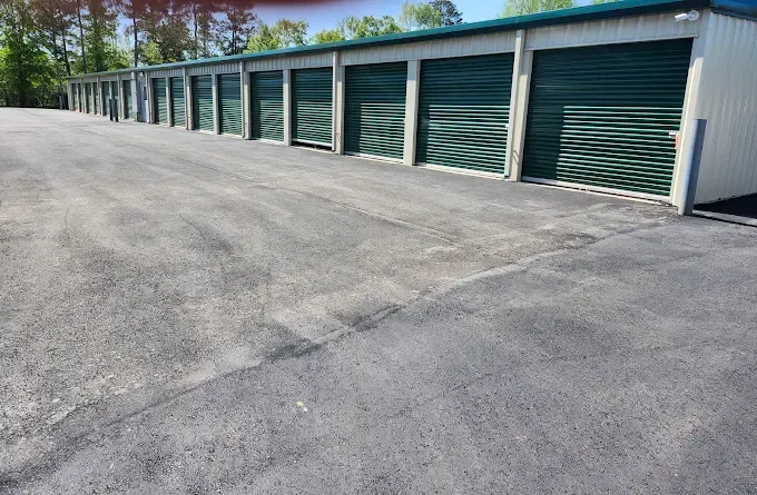 a bunch of padlocks are hanging on a wall