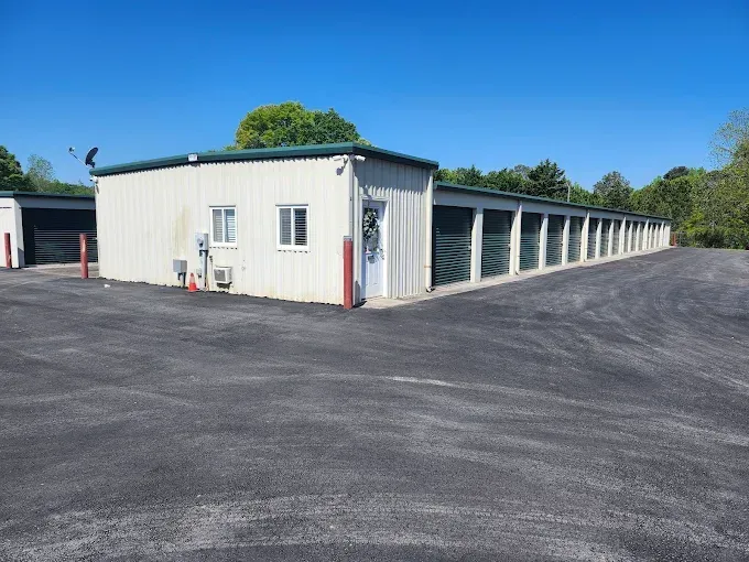 Red wooden door with a locked padlock
