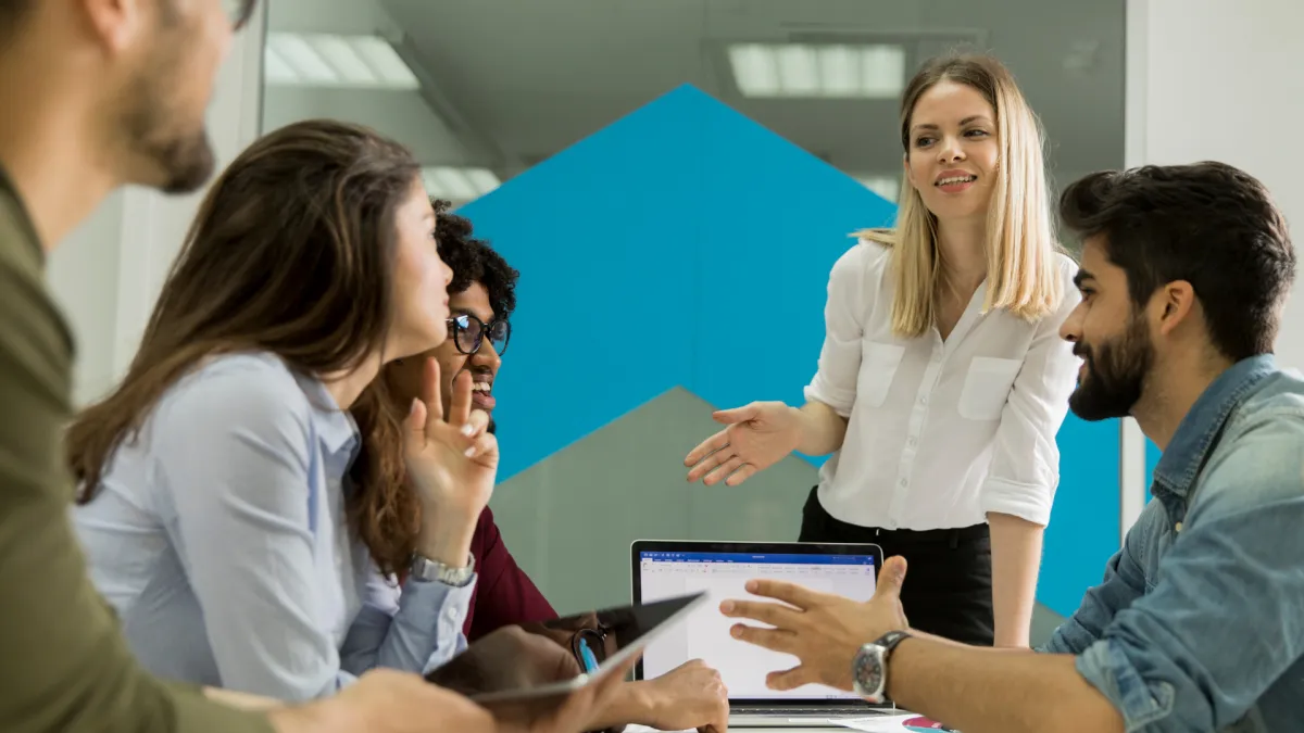 A generic stock image showing peple working collaboratively