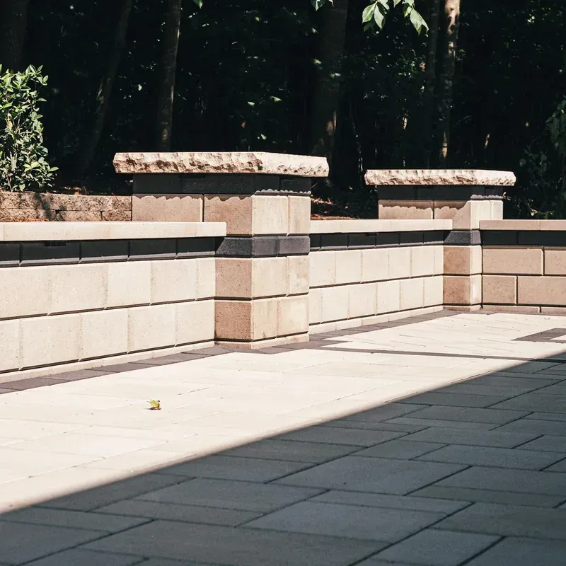 retaining wall installation with stone blocks in Raleigh Durham NC