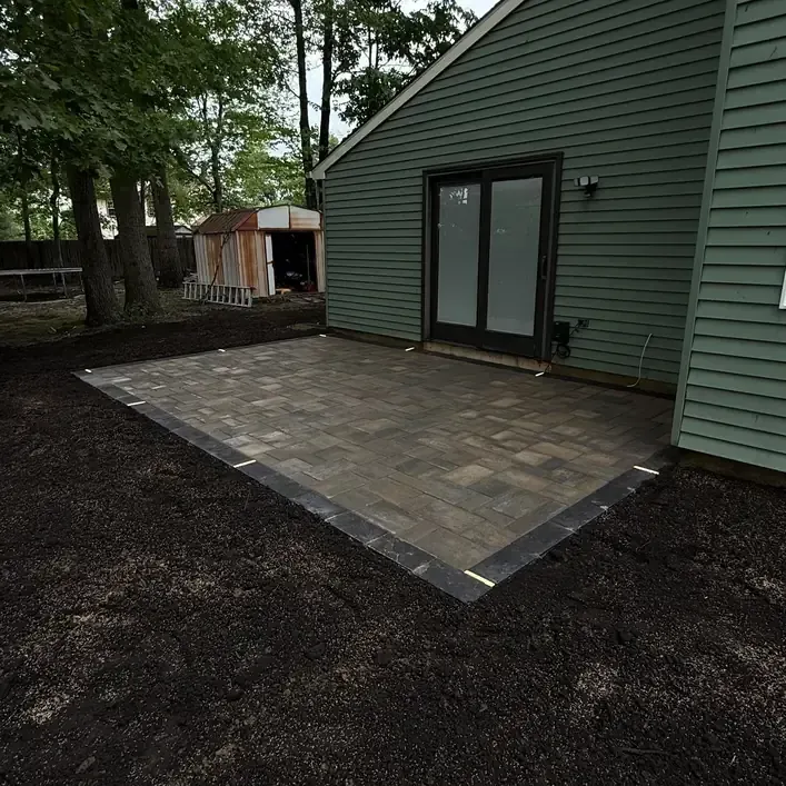 hardscape patio with clean landscaping in Raleigh Durham area