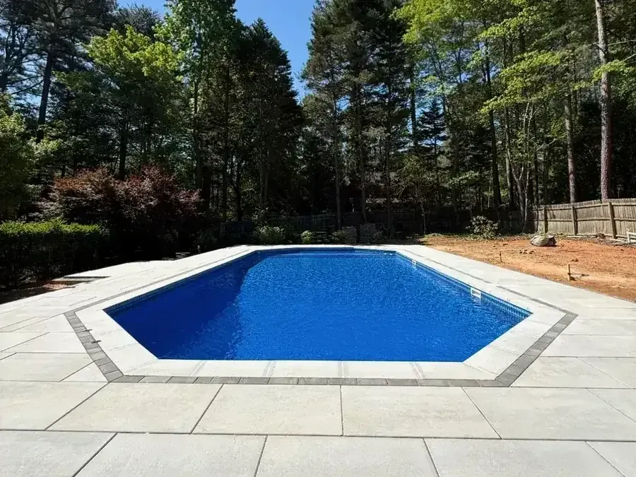 hardscape patio with pavers and stone features installed in Raleigh NC