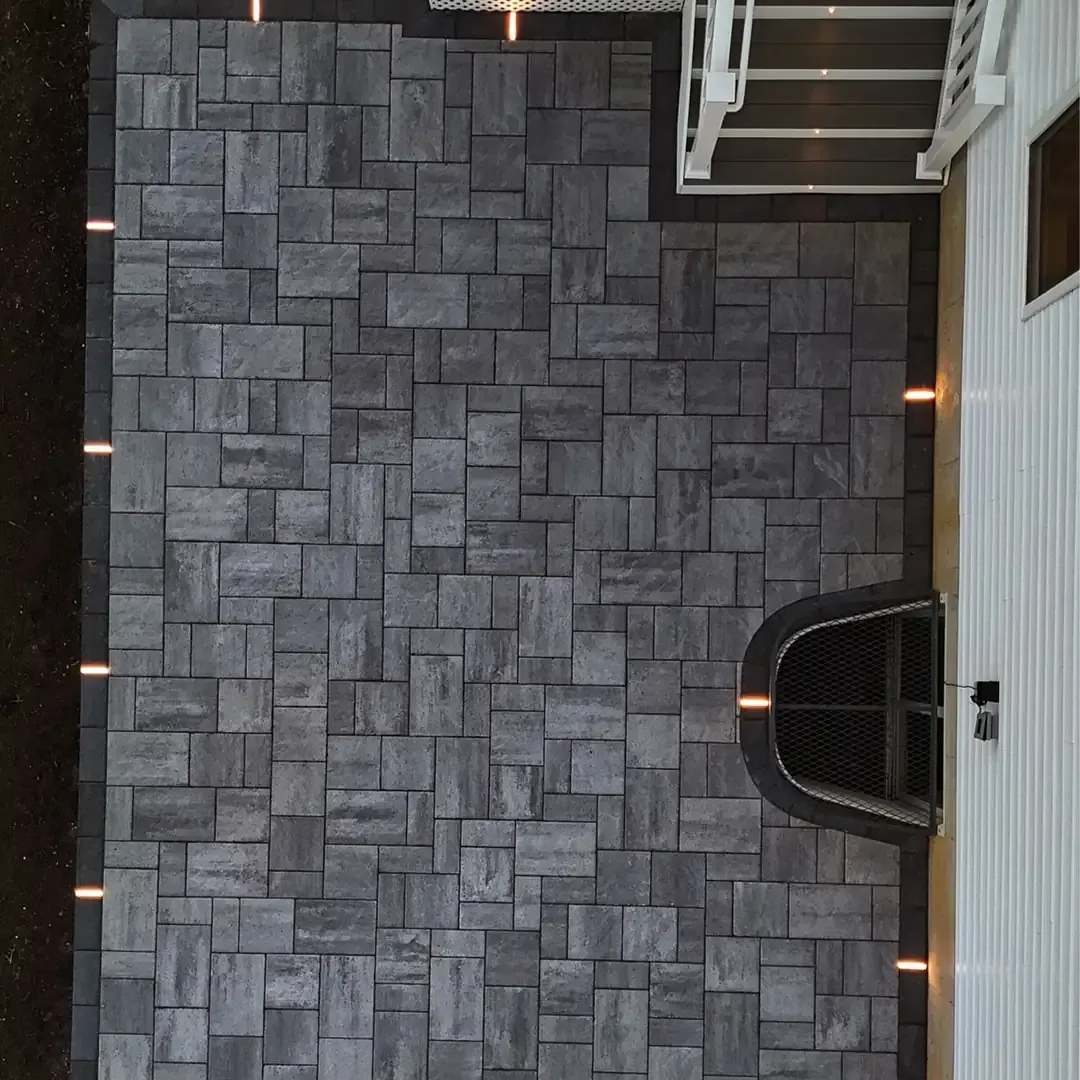 stone hardscape wall with recessed LED lighting in Raleigh NC