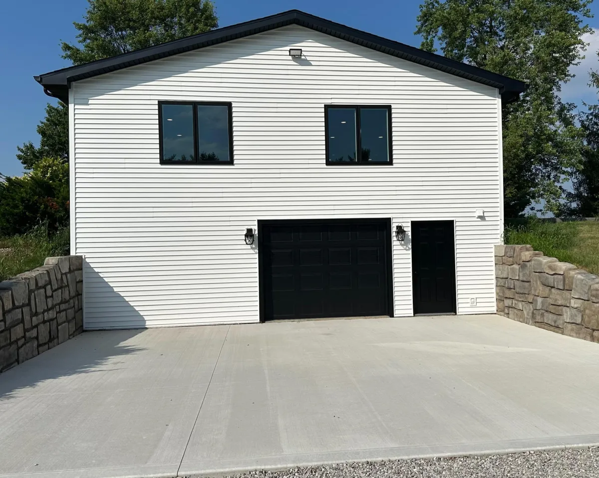 Beautiful home with newly installed siding, showcasing improved curb appeal and long-lasting exterior protection.