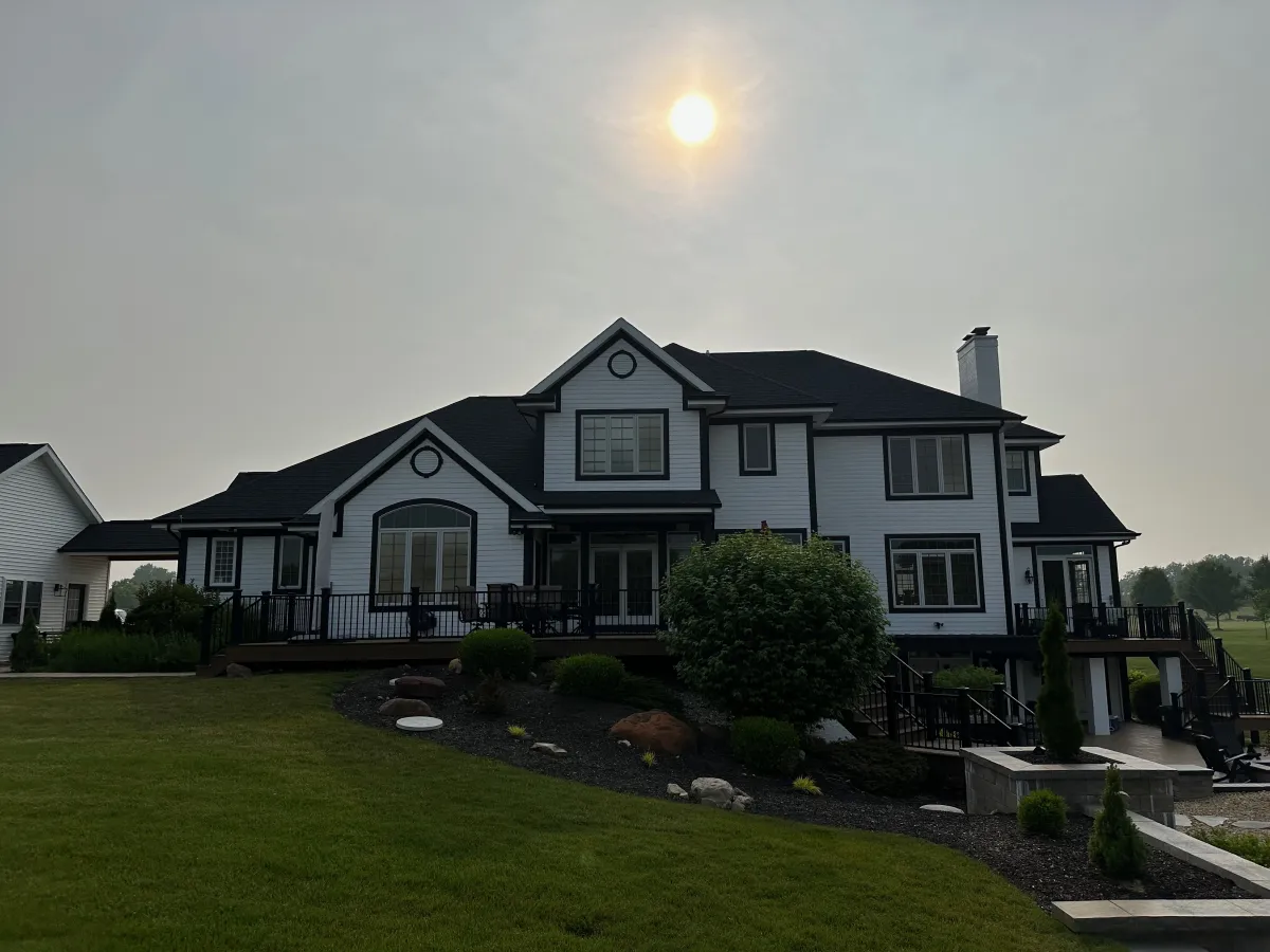Modern residential roof with attic ventilation designed to improve home energy efficiency and indoor air quality.