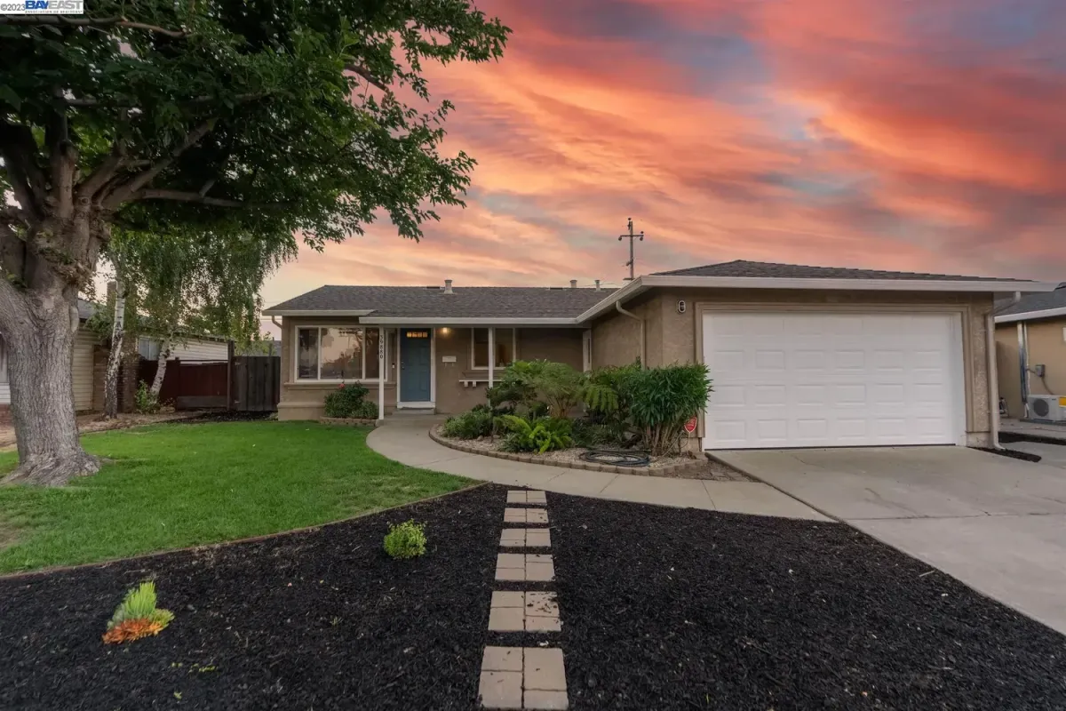 Charming property at 39880 Besco Drive Fremont CA showcasing sunset curb appeal and well-maintained single-story layout
