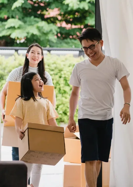 Family moving boxes while selling home fast with Fremont CA real estate agent El Claveria for top dollar closing