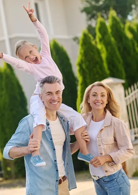 Happy family outdoors, symbolizing trust and confidence clients feel when choosing a reliable Fremont real estate agent like El.