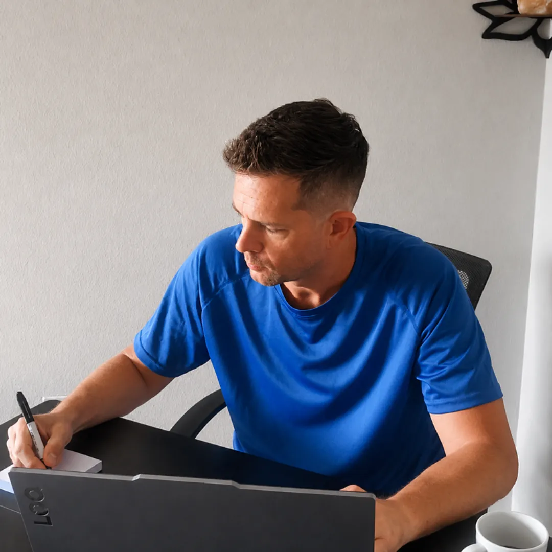 Jeremy reviewing notes and preparing a follow-up
