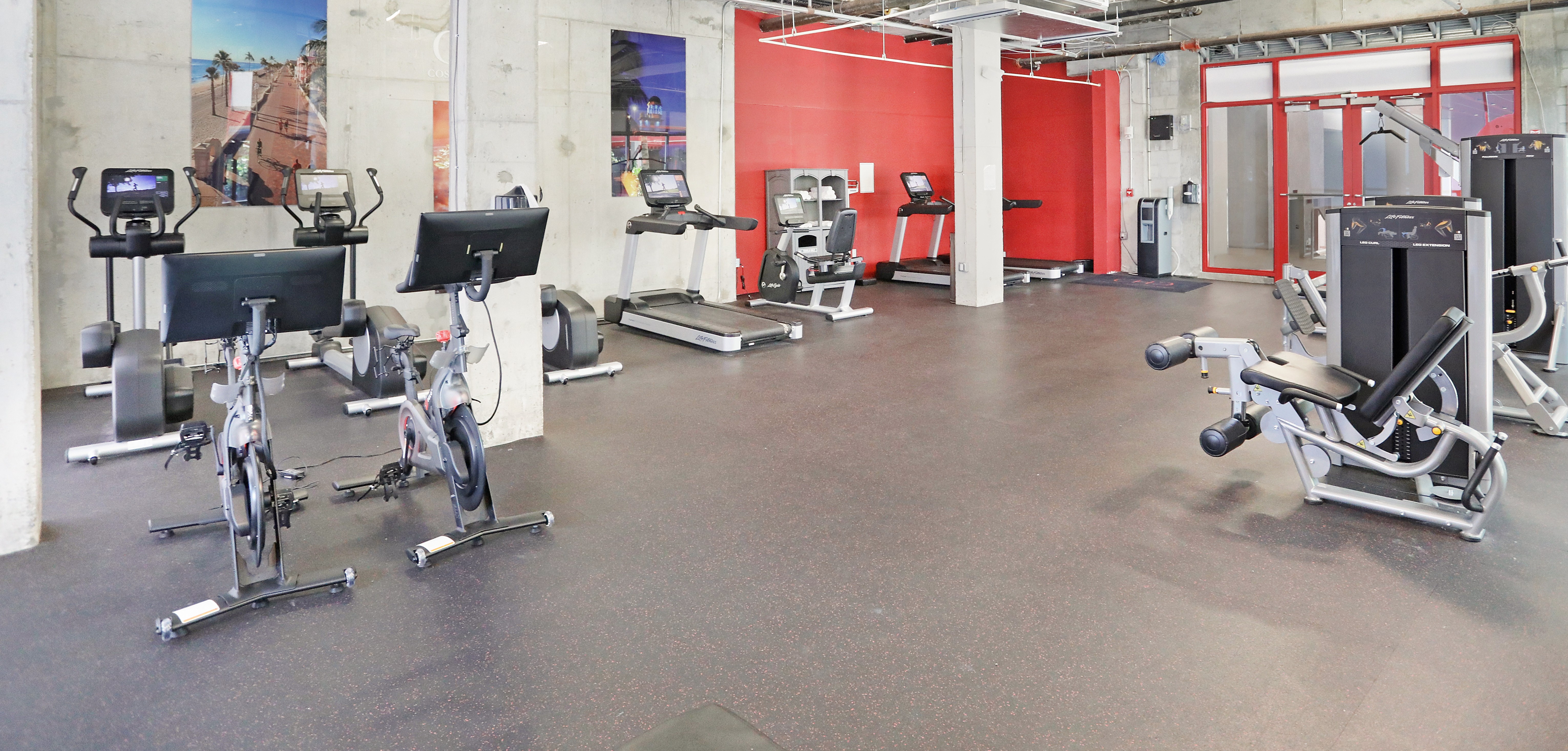 a living room filled with furniture and a fire place