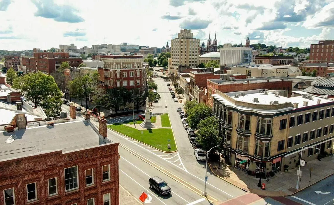 Historic courthouse and downtown Macon architecture surrounded by greenery