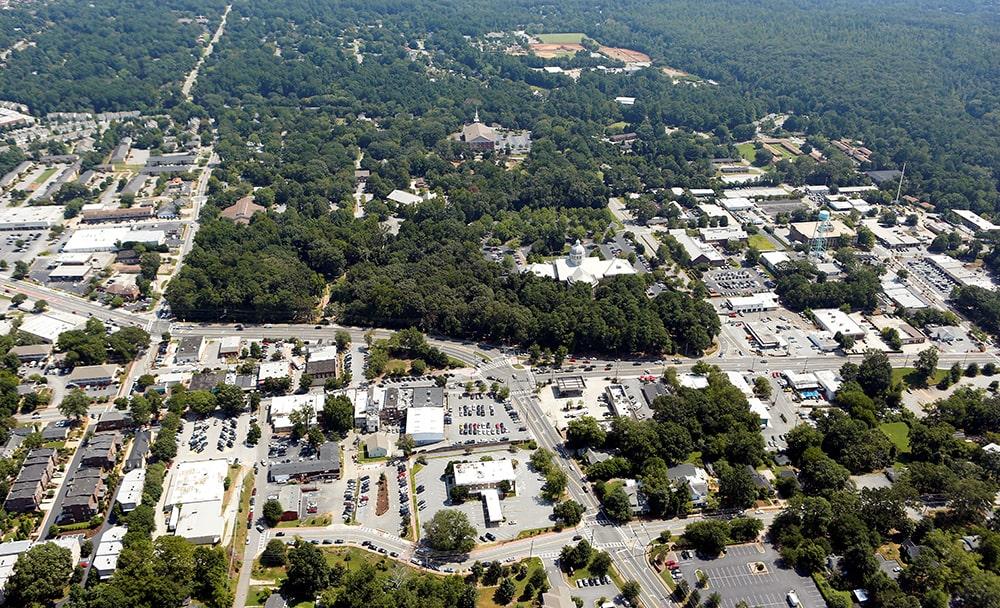 Overhead shot of Roswell’s wooded neighborhoods and residential layout