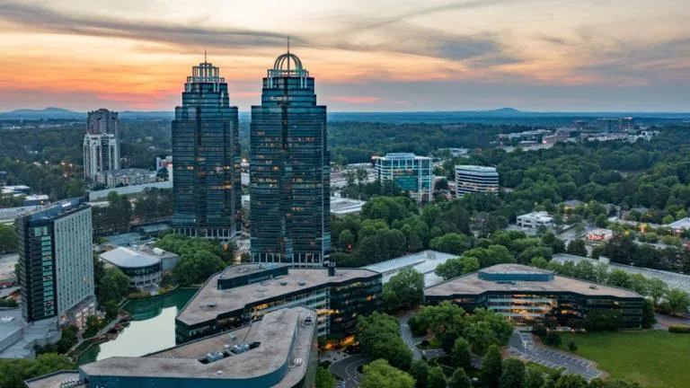 Twin towers and urban center of Sandy Springs at sunrise