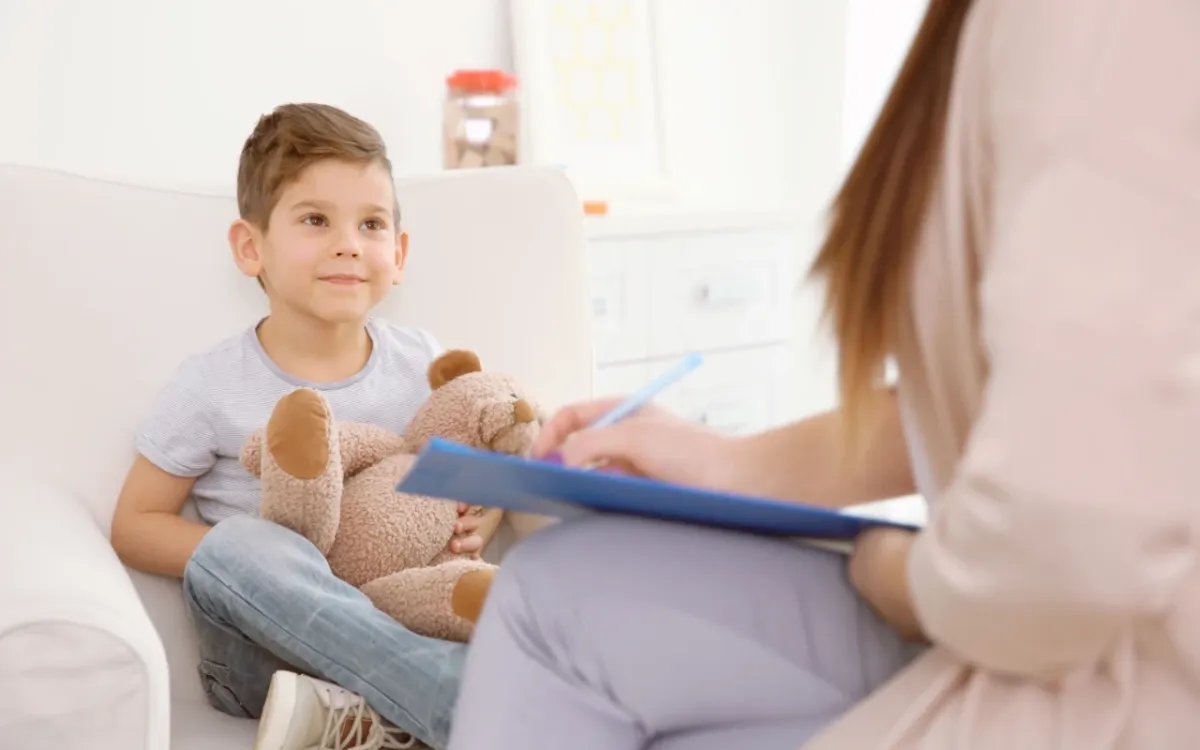 boy in therapy happy