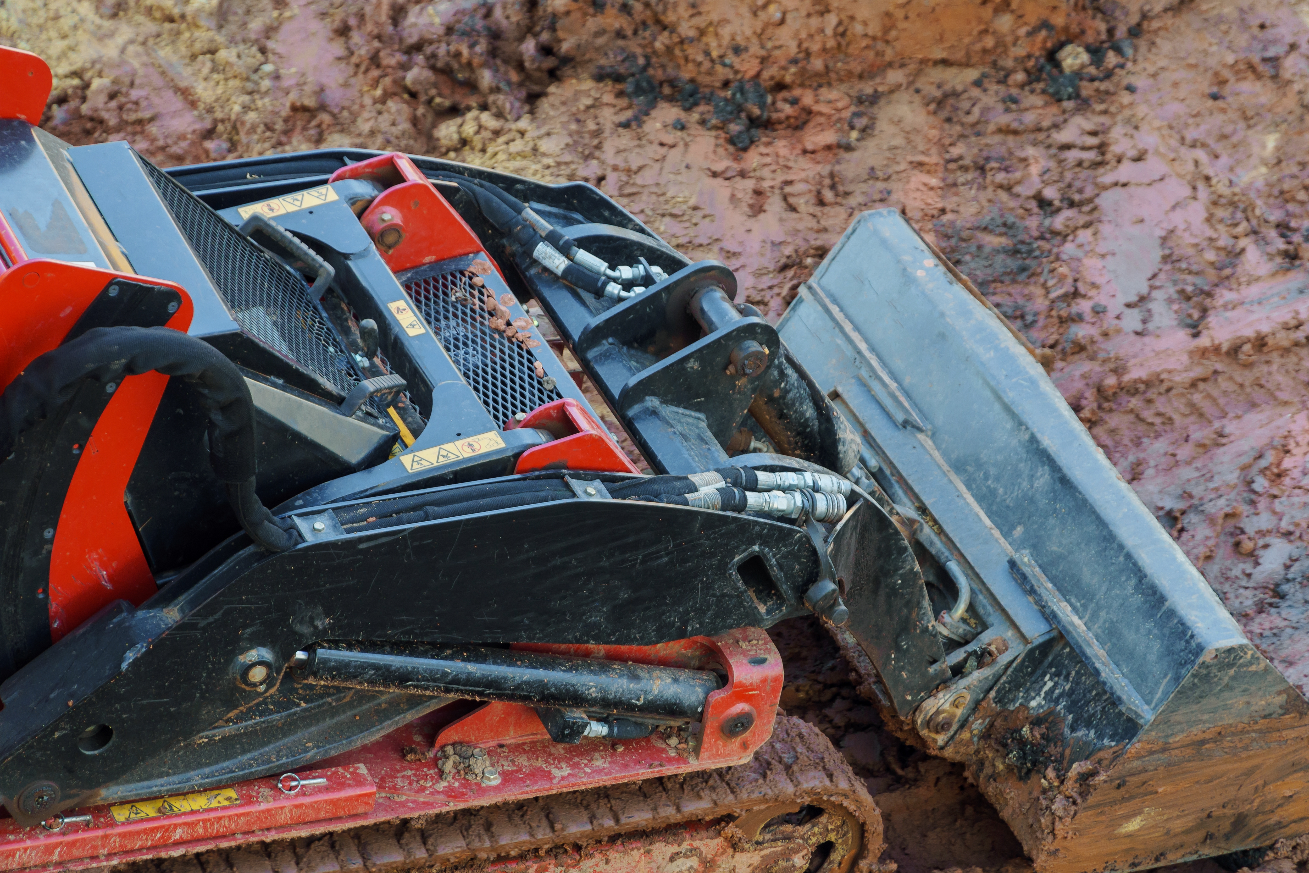Skid Steer Log Splitter vs. Standalone Splitter: Which Is Right for Your Property?