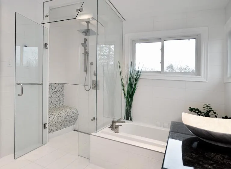 Luxury spa-like bathroom with steam shower, heated floors and towel warmer in Durham Region home