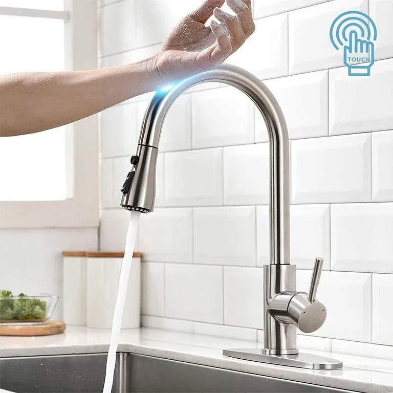 Modern touchless kitchen faucet with water stream activated in Durham Region kitchen