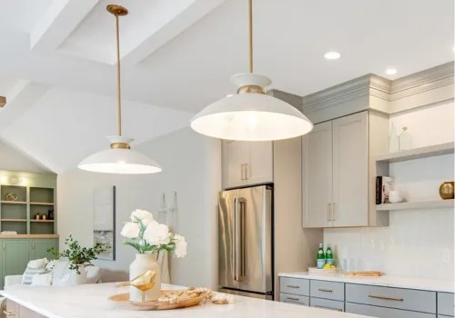 Stylish pendant lights illuminating kitchen island in Durham Region home