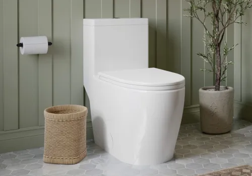 Modern skirted toilet in renovated Durham Region bathroom with clean, streamlined design