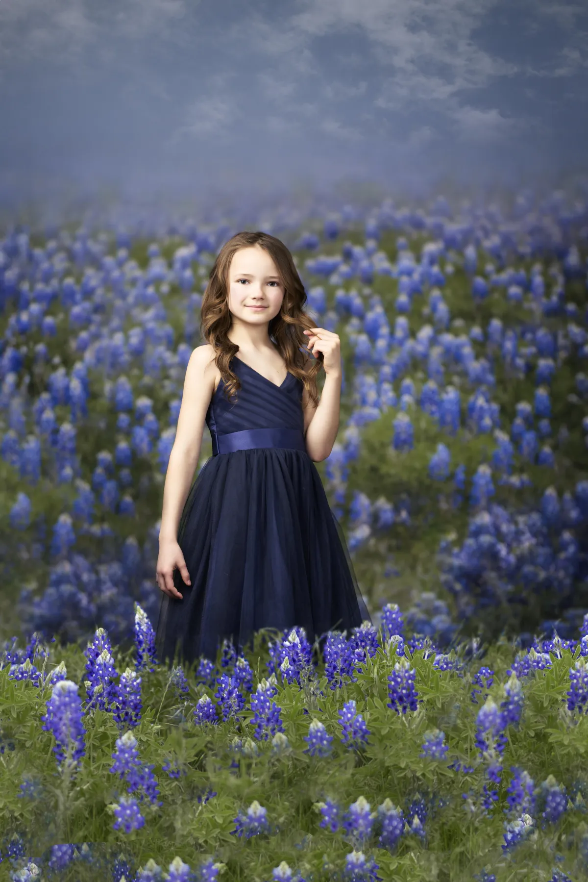 Portrait of a girl in a Bluebonnet Field