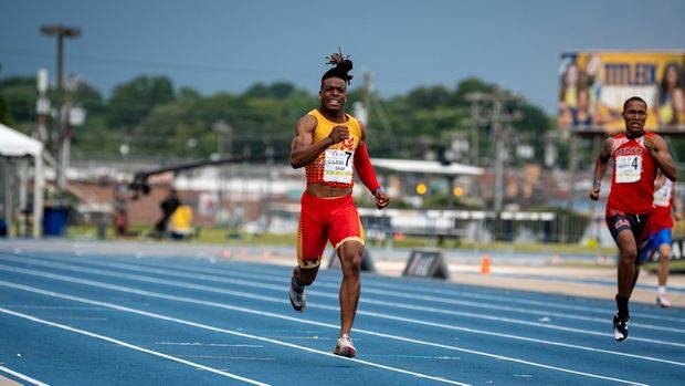 Distance runner maintaining pace on track