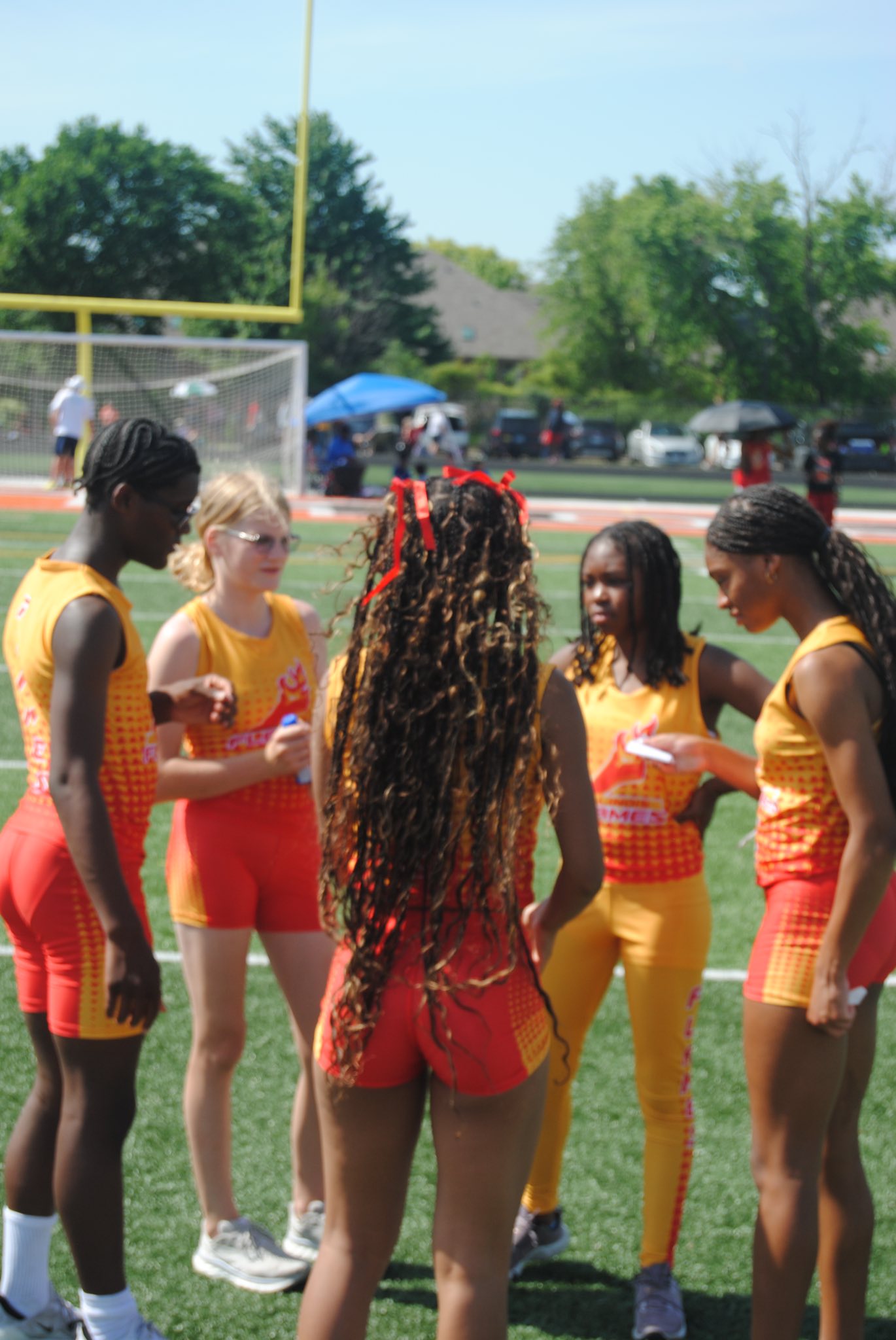 Athletes supporting each other at practice