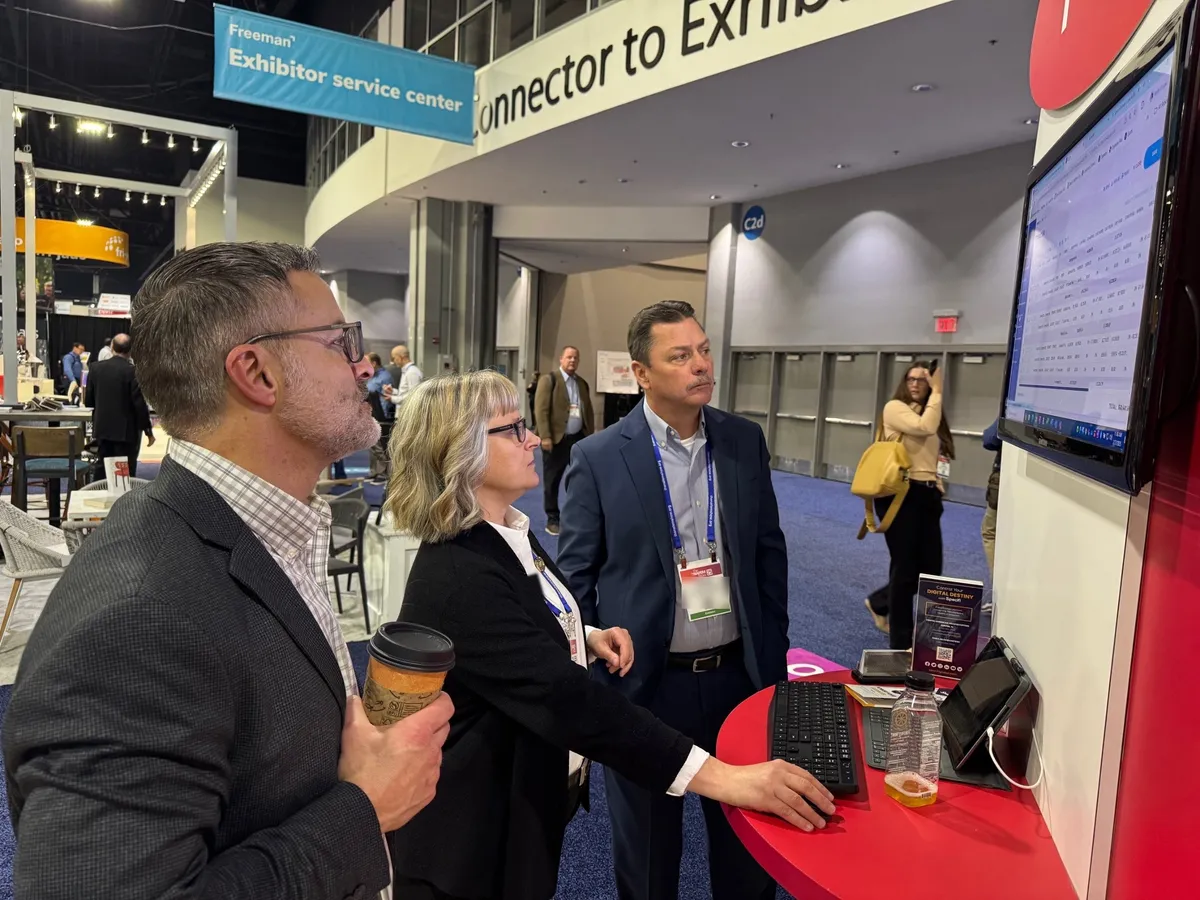 Colleen Linhart with foodservice industry leaders at the NAFEM Show