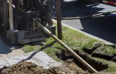 Sewer line excavation underway near residential curb by Pickerington Emergency Plumbers