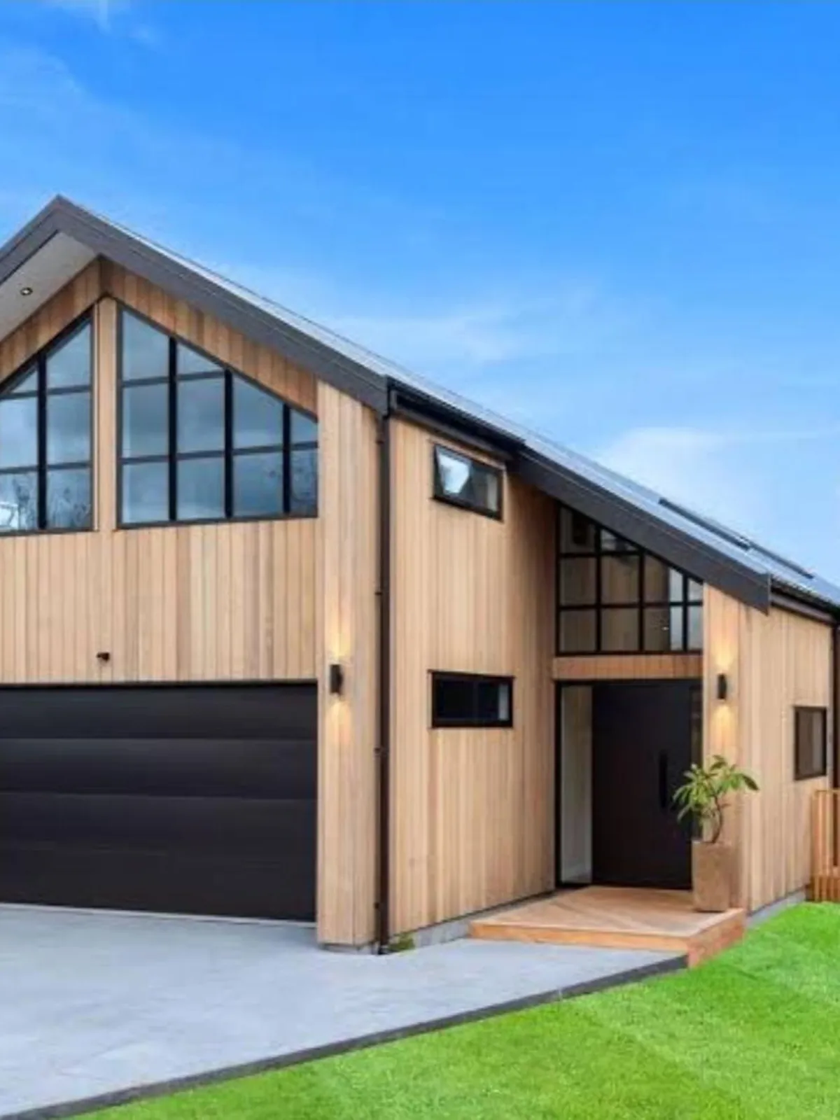 Modern home with light natural cedar cladding stained for weather protection and rich finish