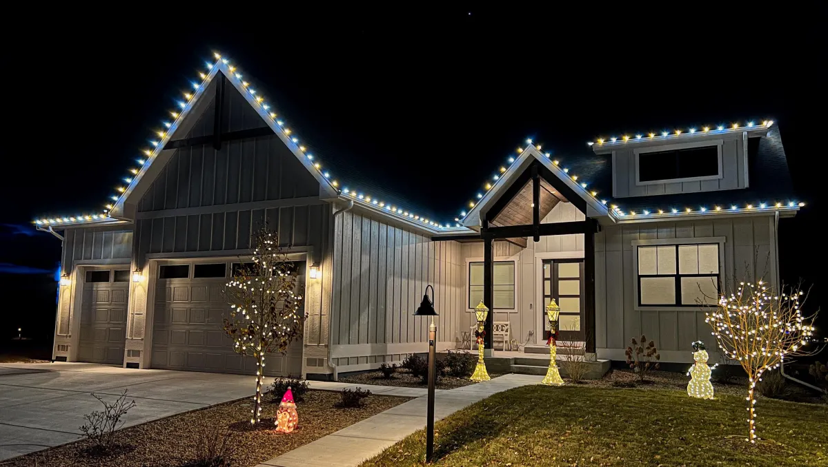 Loveland home with professional C9 LED roofline Christmas lights cool white and warm white
