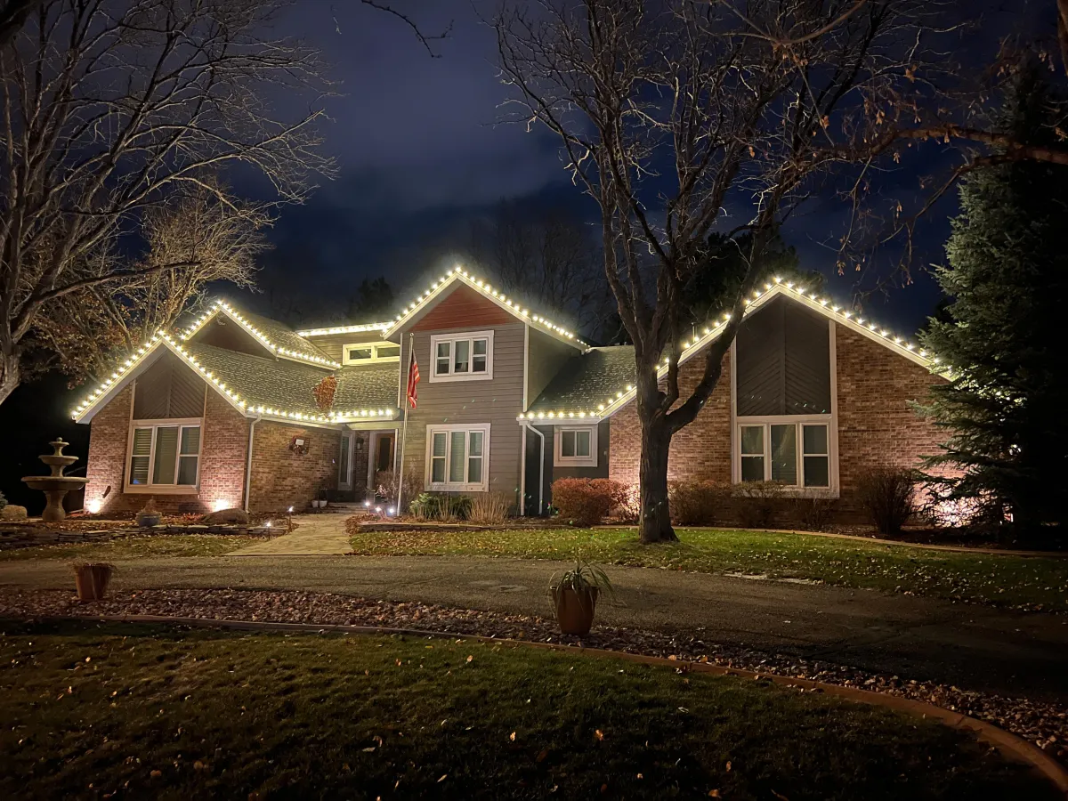 Greeley home outlined with warm light C9 LED roofline Christmas lights