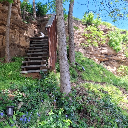 “Wooden steps leading up the Mississippi River bluffs at Tama’s Lookout”