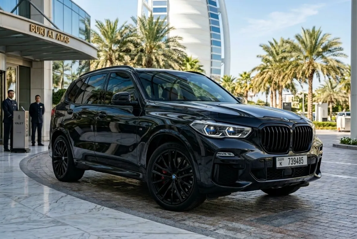 Black BMW X5 M Sport parked outside Burj Al Arab in Dubai