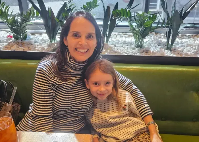 Dr. Patricia Pena and daughter in Chiropractors Dr. Bulkin and Dr. Pena in Lawrenceville, GA